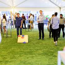 Citadel photo of: Citadel employees playing a lawn game at a company event