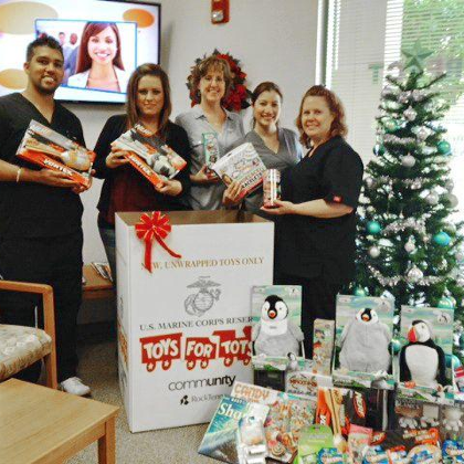  photo of: PERFECT TEETH-Palm Valley and their 2013 Toys for Tots Donation